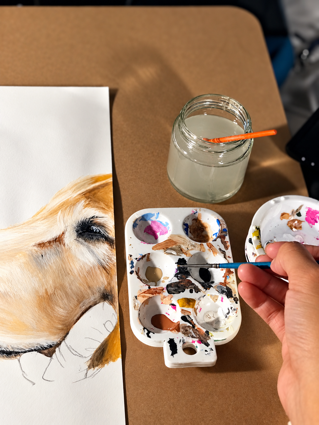 Kasandra creating custom artwork